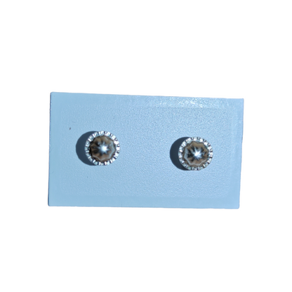 Pendientes Estrella "P" circonita.